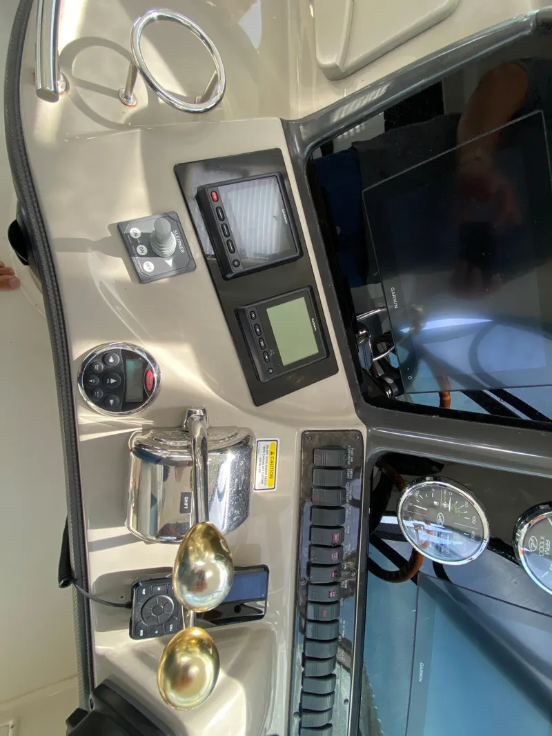 Slide: The Image of Control panel of a 2006 Sea Ray Sundancer 44 yacht. - 15