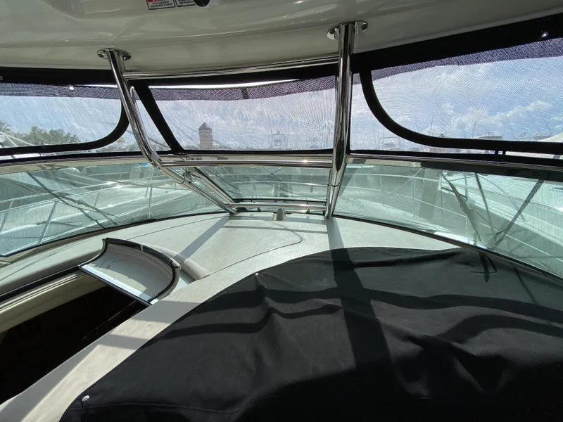 Slide: The Image of Interior view of 2006 Sea Ray Sundancer 44 yacht cockpit with windshield. - 16