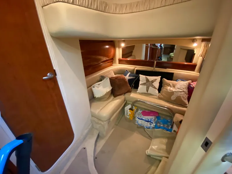Slide: The Image of Interior cabin of 2006 Sea Ray Sundancer 44 with seating and storage. - 20
