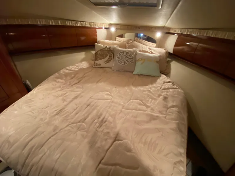 Slide: The Image of Luxurious bedroom in 2006 Sea Ray Sundancer 44 yacht with cozy bedding. - 22