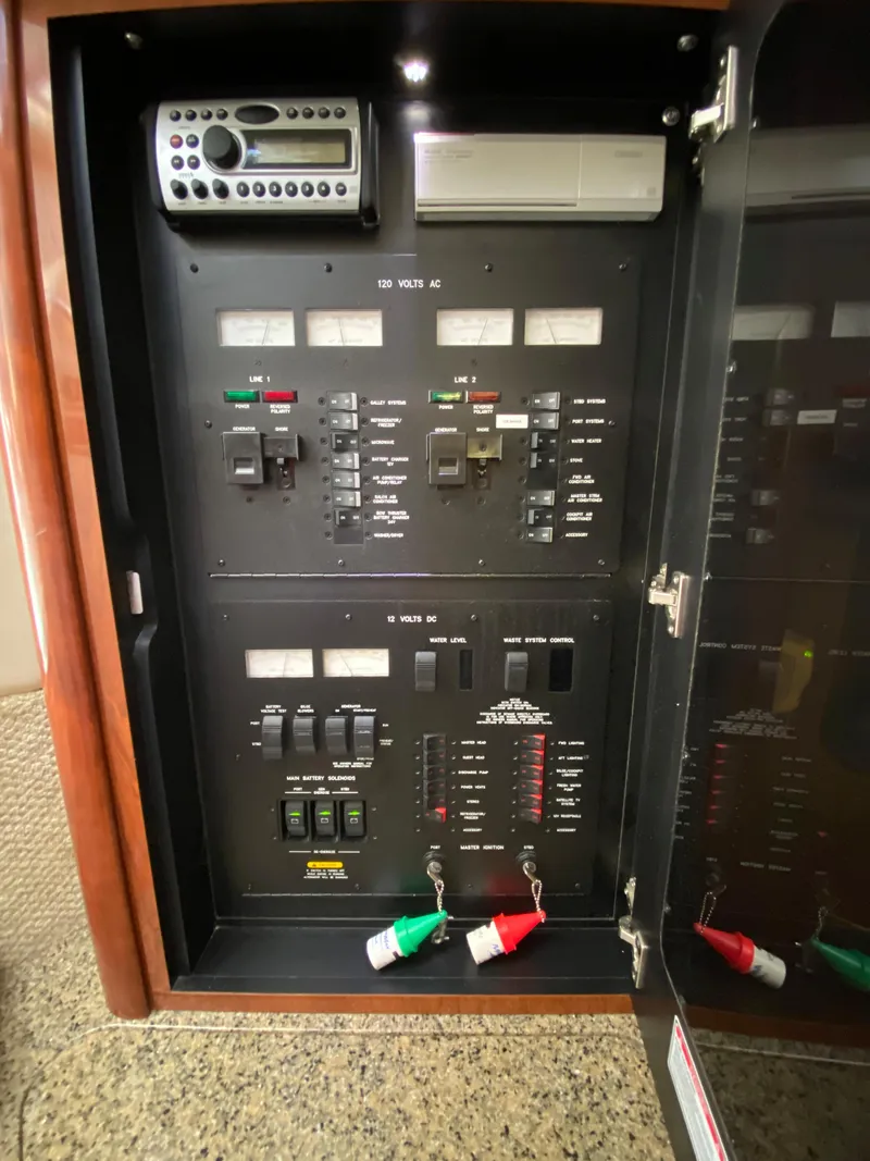 Slide: The Image of Electrical control panel of a 2006 Sea Ray Sundancer 44 yacht. - 28