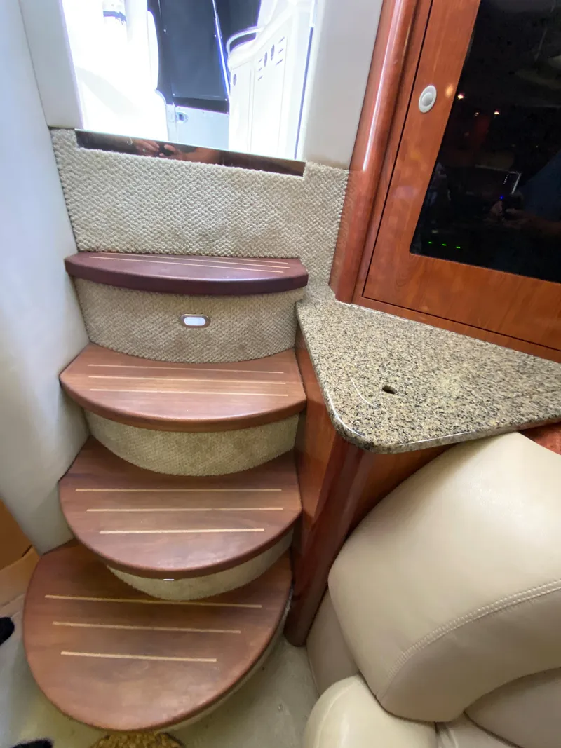 Slide: The Image of Wooden steps and granite counter in 2006 Sea Ray Sundancer 44 yacht interior. - 29