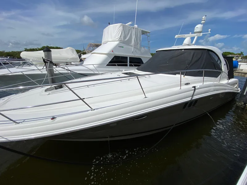 Slide: The Image of 2006 Sea Ray Sundancer 44 yacht docked in marina. - 3
