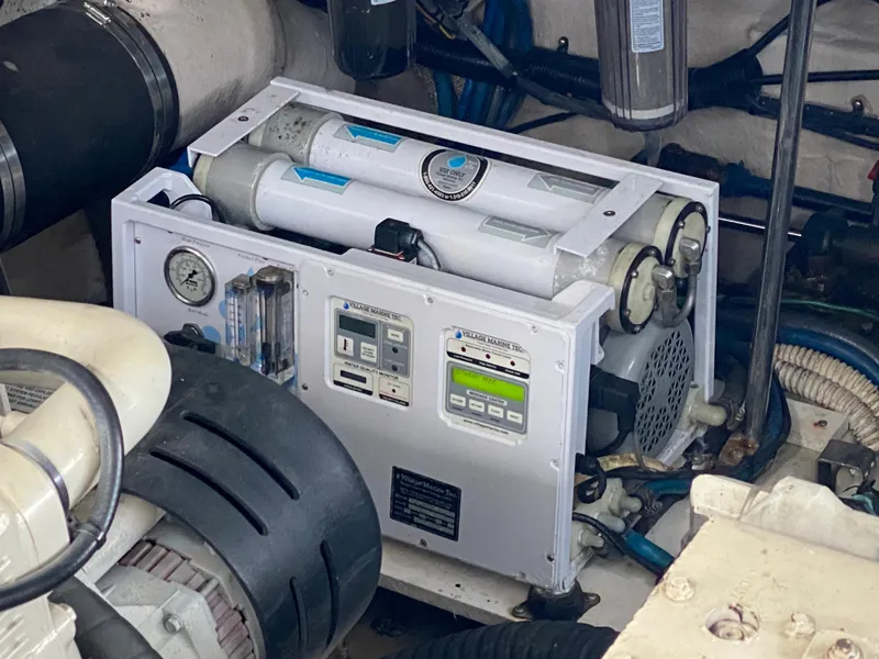Slide: The Image of Engine room of a 2006 Sea Ray Sundancer 44 yacht showing machinery. - 30