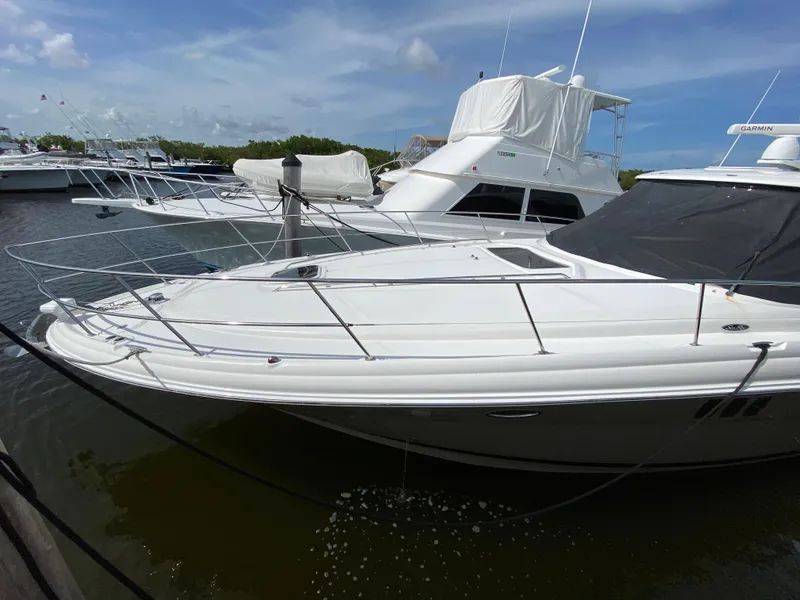 Slide: The Image of 2006 Sea Ray Sundancer 44 yacht docked at marina. - 4