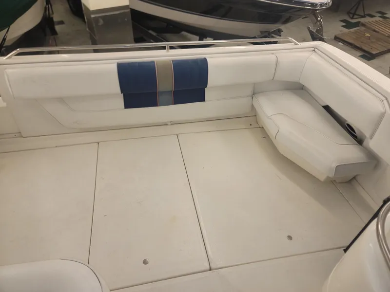 Slide: The Image of Interior seating area of a 1992 Sea Ray 330 Sundancer boat. - 22