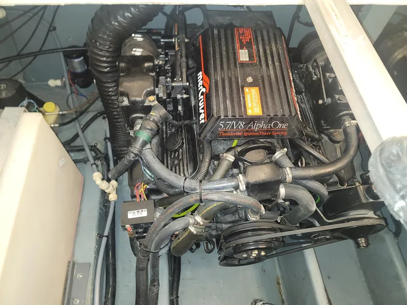 Slide: The Image of 1992 Sea Ray 330 Sundancer engine compartment with 5.7L V8 Alpha One engine. - 47