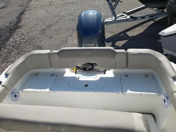 Slide: The Image of 2023 Key West 203 FS boat interior with Yamaha 150 outboard motor. - 5