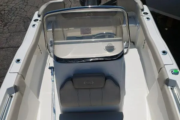 Slide: The Image of 2023 Key West 203 FS boat interior with console and seating. - 8