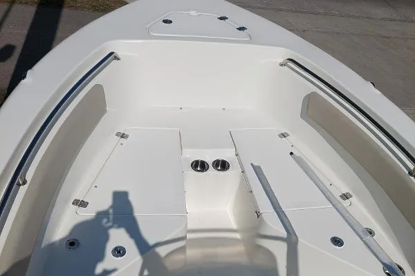 Slide: The Image of 2023 Key West 203 FS boat interior with seating and cup holders. - 9