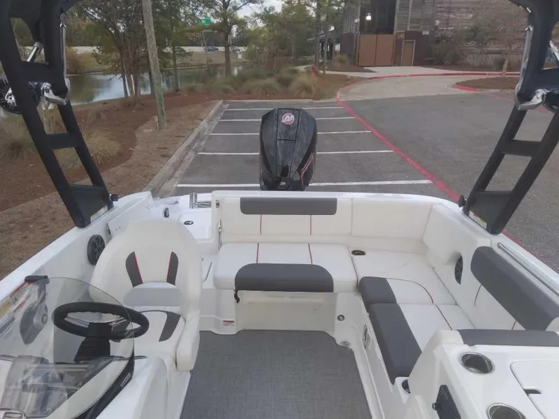 Slide: The Image of Tahoe 1950 boat interior, 2023 model, featuring seating and steering wheel. - 15