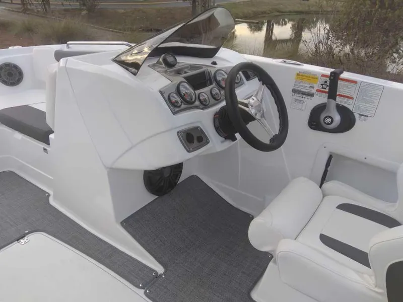 Slide: The Image of Tahoe 1950 boat dashboard and steering wheel, 2023 model, white interior. - 17