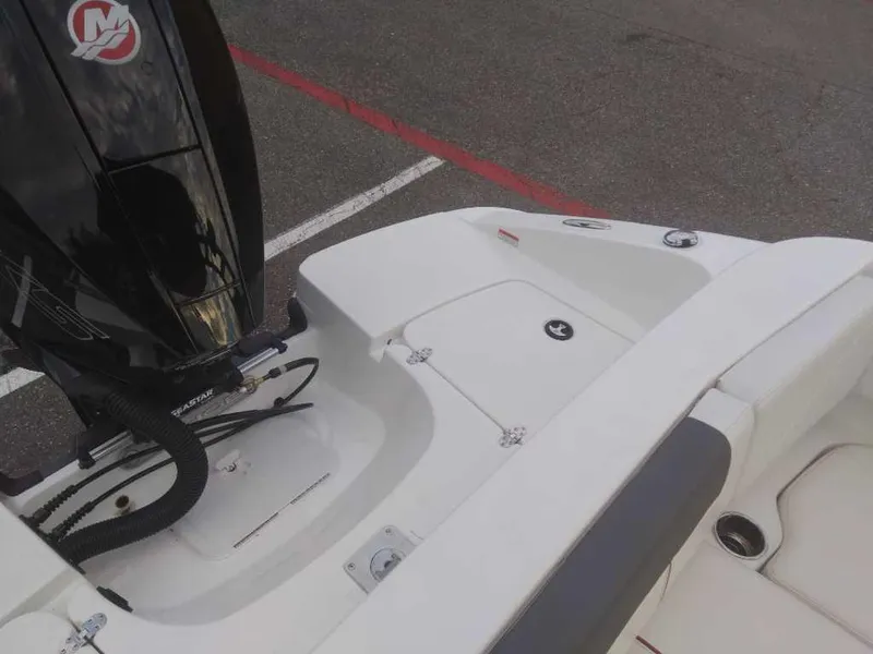 Slide: The Image of 2023 Tahoe 1950 boat stern with Mercury outboard motor. - 19