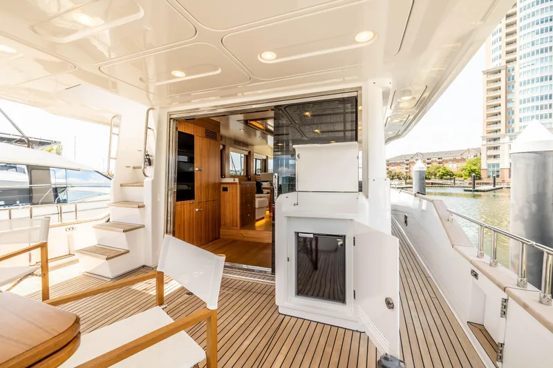 Slide: The Image of Luxury Sirena 58 yacht interior, 2025 model, featuring modern design and spacious deck. - 16