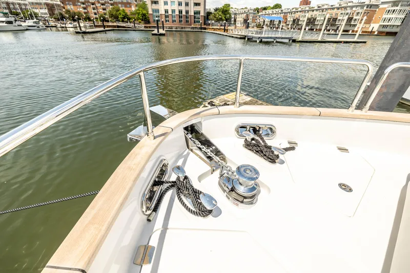 Slide: The Image of Bow deck of 2025 Sirena 58 yacht docked in a marina. - 21