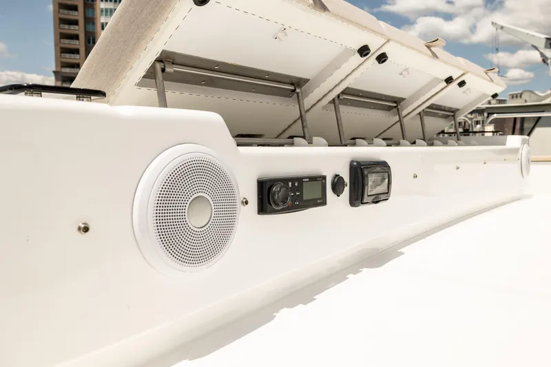 Slide: The Image of Close-up of the 2025 Sirena 58 yacht's audio system and control panel. - 23