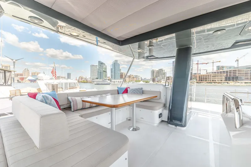 Slide: The Image of Modern Sirena 58 yacht interior, 2025 model, with city skyline view. - 27