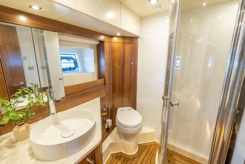 Slide: The Image of Modern bathroom in 2025 Sirena 58 yacht with wooden accents and sleek fixtures. - 44