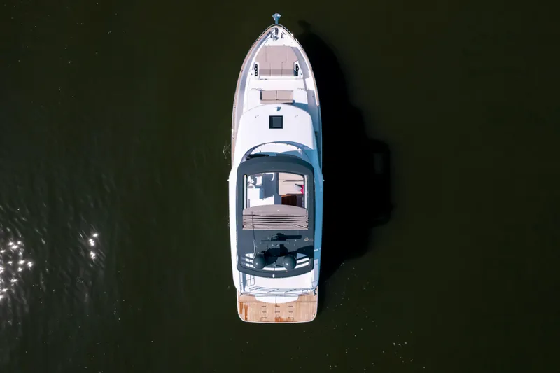 Slide: The Image of Aerial view of 2025 Sirena 58 yacht on calm water. - 8