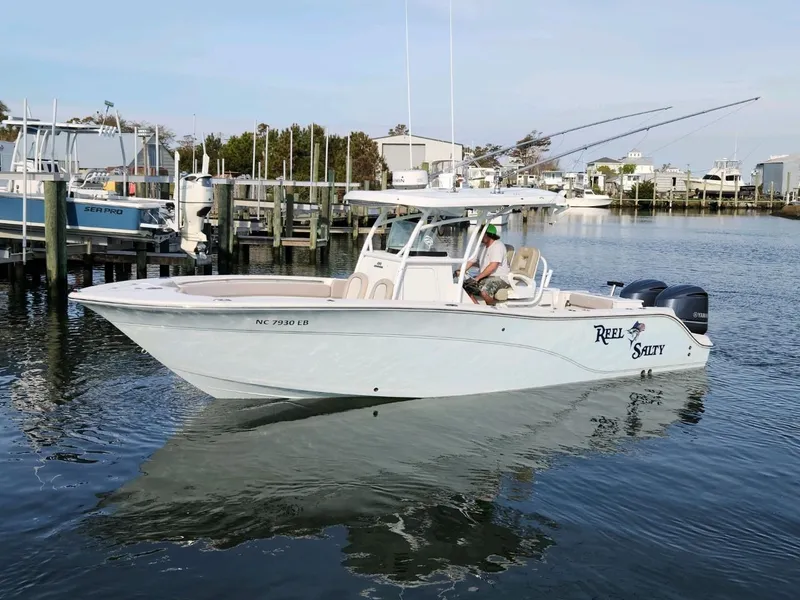 Slide: The Image of 2015 Sea Fox 286 Commander boat docked in a marina. - 11