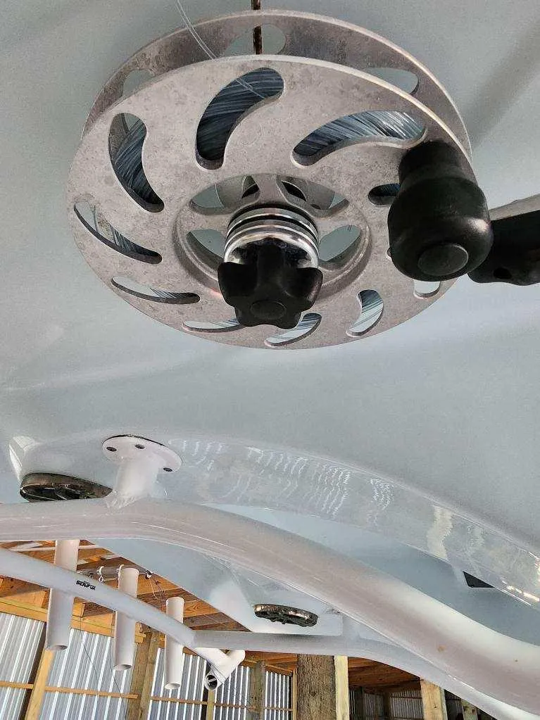 Slide: The Image of Close-up of a 2015 Sea Fox 286 Commander fishing reel mechanism. - 13