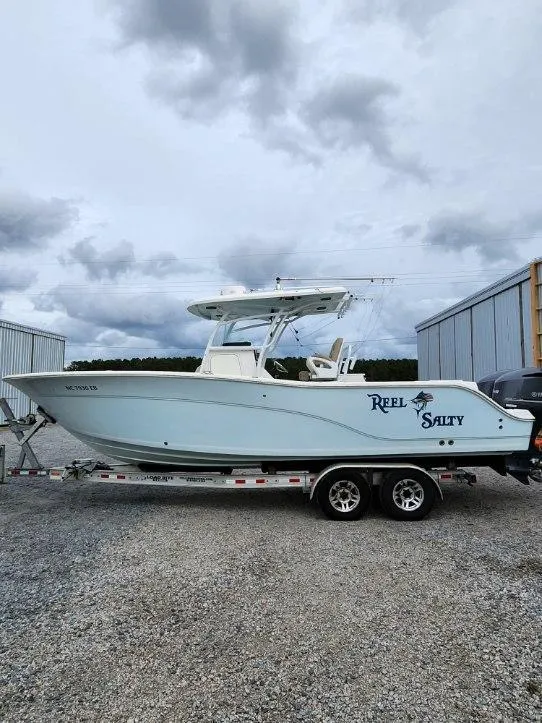 Slide: The Image of 2015 Sea Fox 286 Commander boat on a trailer, side view. - 16
