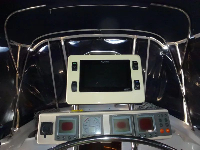 Slide: The Image of Hunter 420 Passage 2001 yacht cockpit with navigation instruments and display. - 10