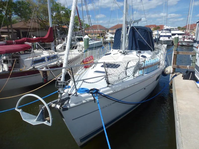 Slide: The Image of 2001 Hunter 420 Passage sailboat docked at marina. - 3