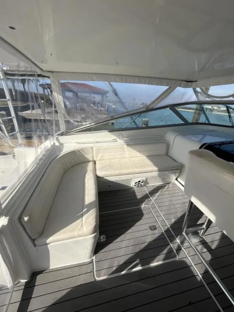 Slide: The Image of 1993 Bertram 46 Moppie boat interior with seating and helm station. - 11