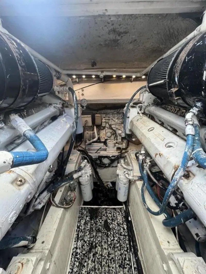 Slide: The Image of Engine room of a 1993 Bertram 46 Moppie boat. - 18