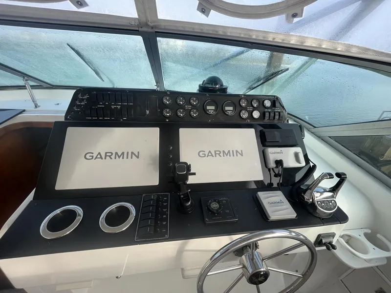 Slide: The Image of 1993 Bertram 46 Moppie helm with Garmin navigation systems. - 3