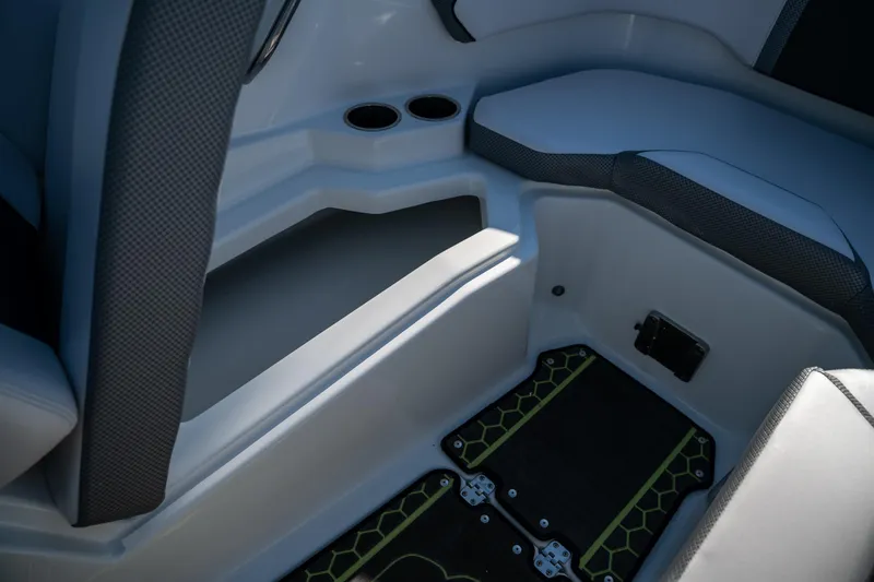Slide: The Image of Interior seating and storage area of a 2022 Scarab 255 boat. - 13