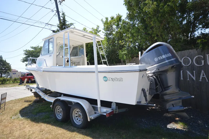 Slide: The Image of 2023 May-Craft 23 Pilothouse boat on trailer with Yamaha outboard motor. - 5