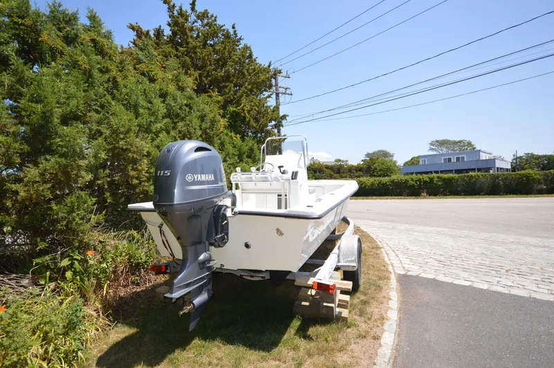 Slide: The Image of 2023 May-Craft 19 HANCOCK boat with Yamaha 115 engine on a trailer. - 3