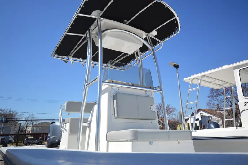 Slide: The Image of 2023 May-Craft 22 HANCOCK boat with T-top and center console. - 4