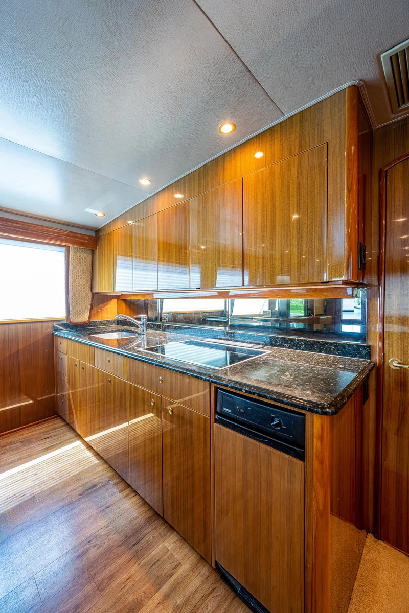 Slide: The Image of Viking 74 Convertible Reel Estate - Galley, Cooktop, Strage Cabinets - 6