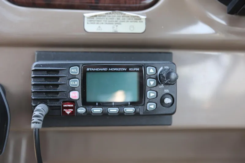Slide: The Image of Standard Horizon Eclipse radio on 2005 Regal Commodore 2665 boat dashboard. - 27