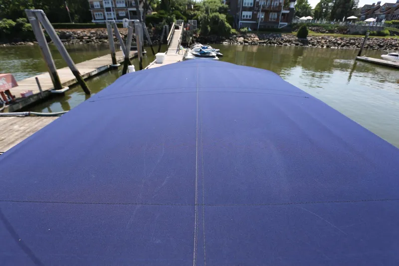 Slide: The Image of Blue boat cover on 2005 Regal Commodore 2665 at dockside. - 29