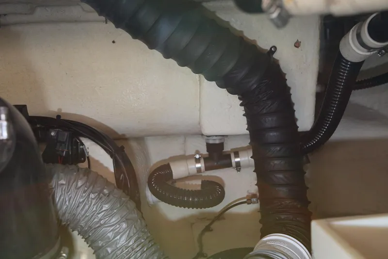 Slide: The Image of Engine compartment of 2005 Regal Commodore 2665 with hoses and wiring. - 37