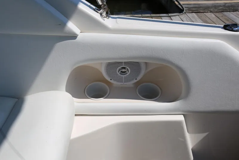 Slide: The Image of 2005 Regal Commodore 2665 boat interior with speaker and cup holders. - 41