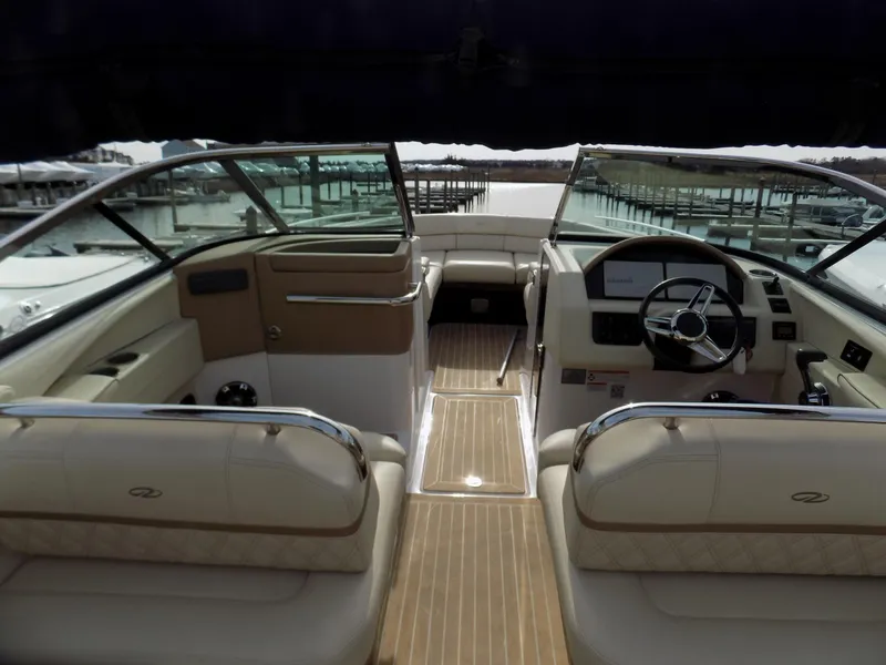 Slide: The Image of 2019 Regal 2800 Bowrider interior with luxurious seating and modern dashboard. - 5