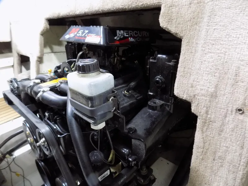 Slide: The Image of Engine compartment of a 2001 Chaparral 216 SSi boat with Mercury 5.7L engine. - 14