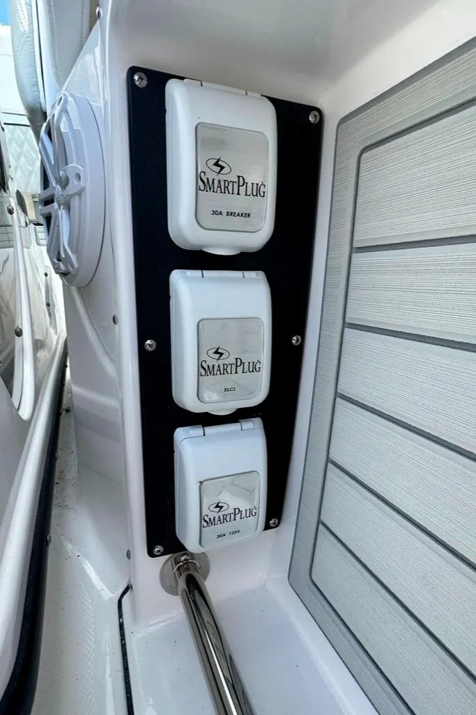 Slide: The Image of 2024 Blackfin 302 DC boat with SmartPlug electrical outlets. - 26