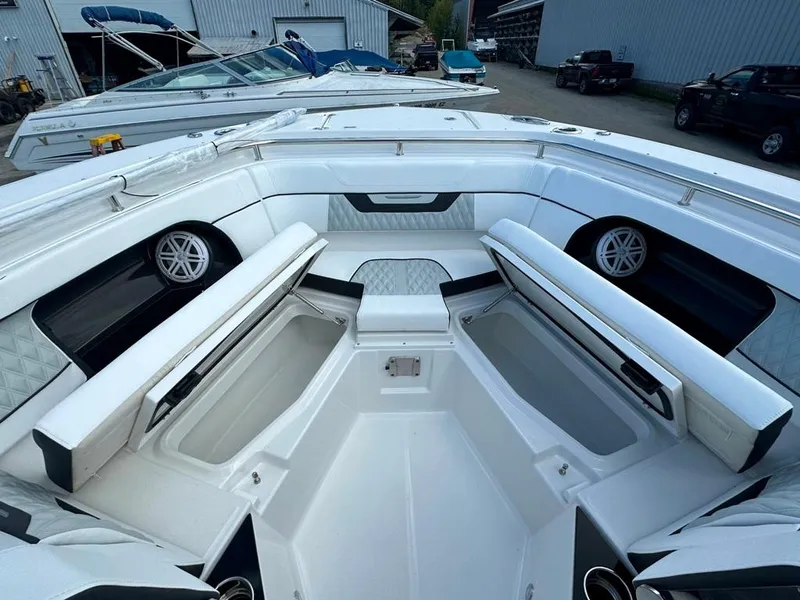 Slide: The Image of 2024 Blackfin 302 DC boat interior with open storage compartments. - 39