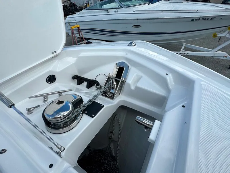 Slide: The Image of 2024 Blackfin 302 DC boat anchor compartment with winch and chain. - 41