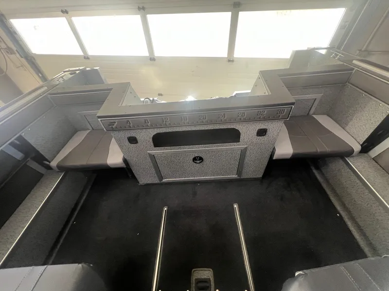 Slide: The Image of 2023 Starcraft Fishmaster 196 interior, featuring spacious seating and modern design. - 7