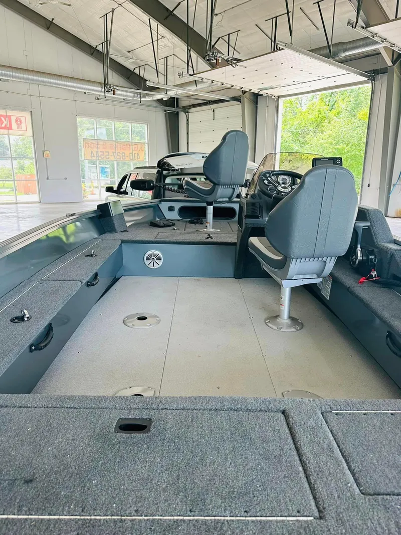 Slide: The Image of Control panel of 2023 Starcraft Storm 166 SC boat with Jensen audio system. - 8