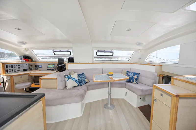 Slide: The Image of Spacious interior of 2016 Catana 42 catamaran with modern seating and navigation area. - 24