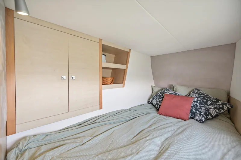 Slide: The Image of Cozy bedroom in 2016 Catana 42 yacht with storage and decorative pillows. - 30