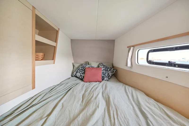 Slide: The Image of Cozy bedroom in 2016 Catana 42 yacht with window and shelving. - 31